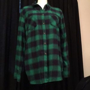 Green and black plaid button down shirt.